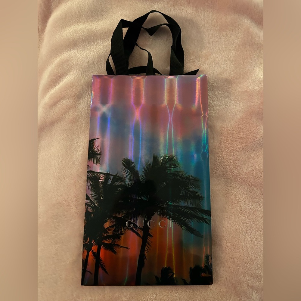 Gucci iridescent paper bag.